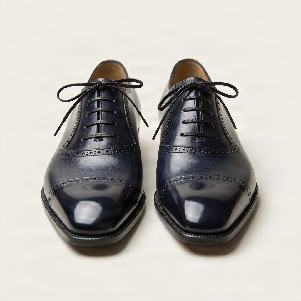 Men's navy leather cap toe brogues