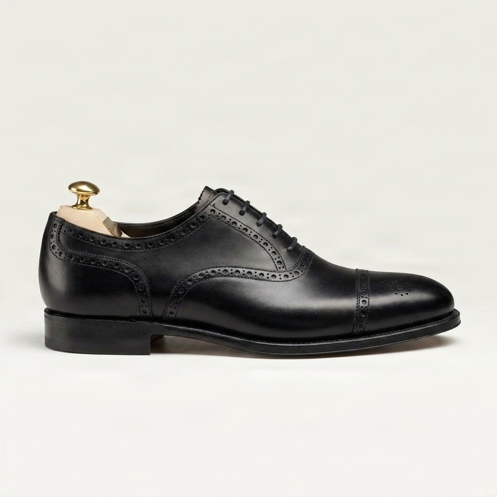 Black leather cap toe brogues medallion punched for men
