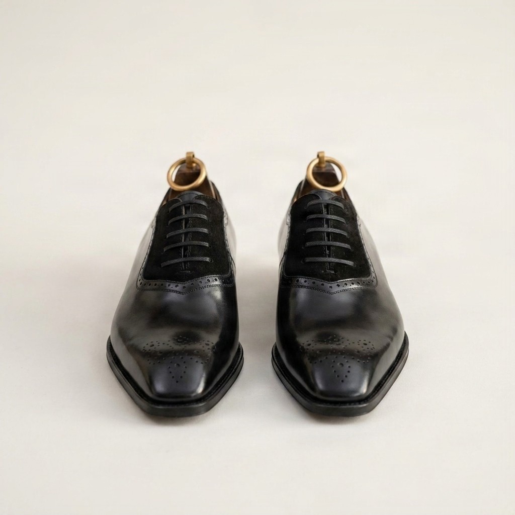 Black suede wingtip brogues