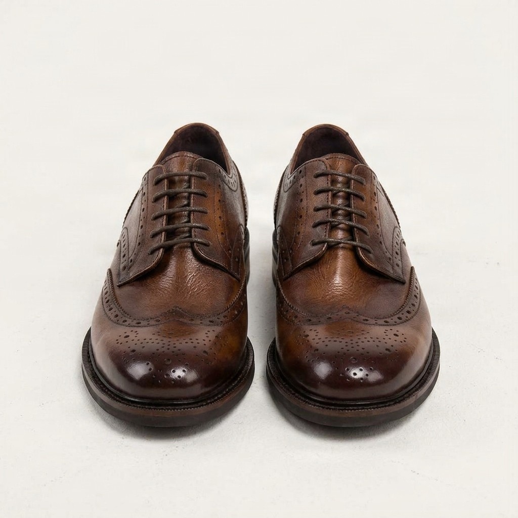 Men's leather wingtip brogues medallion in brown