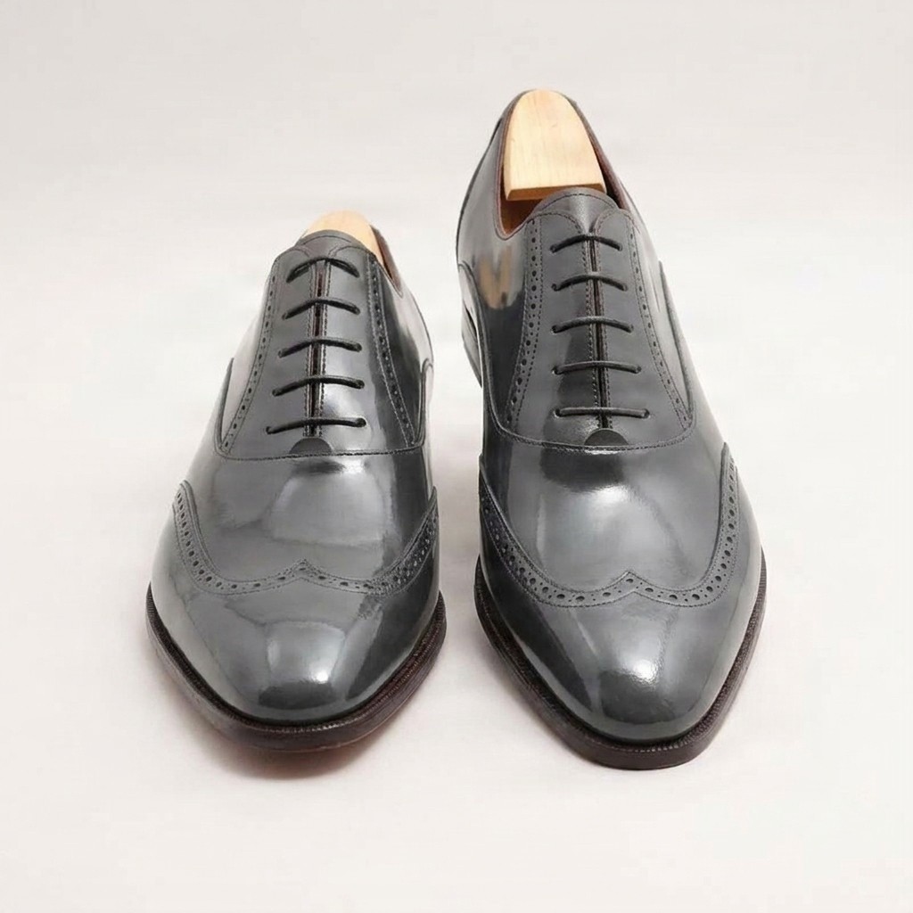 Grey leather wingtip brogues for men
