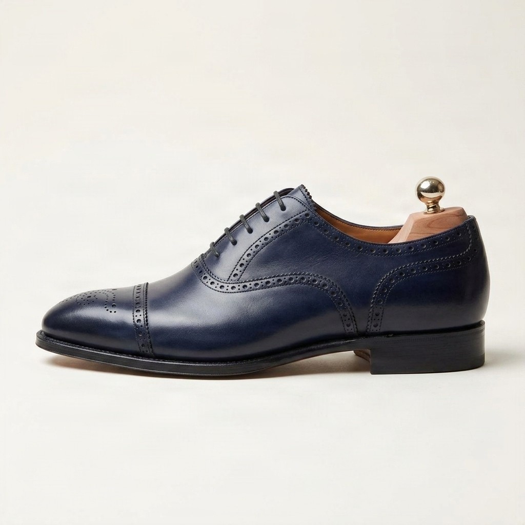 Men's navy leather cap toe brogues punched