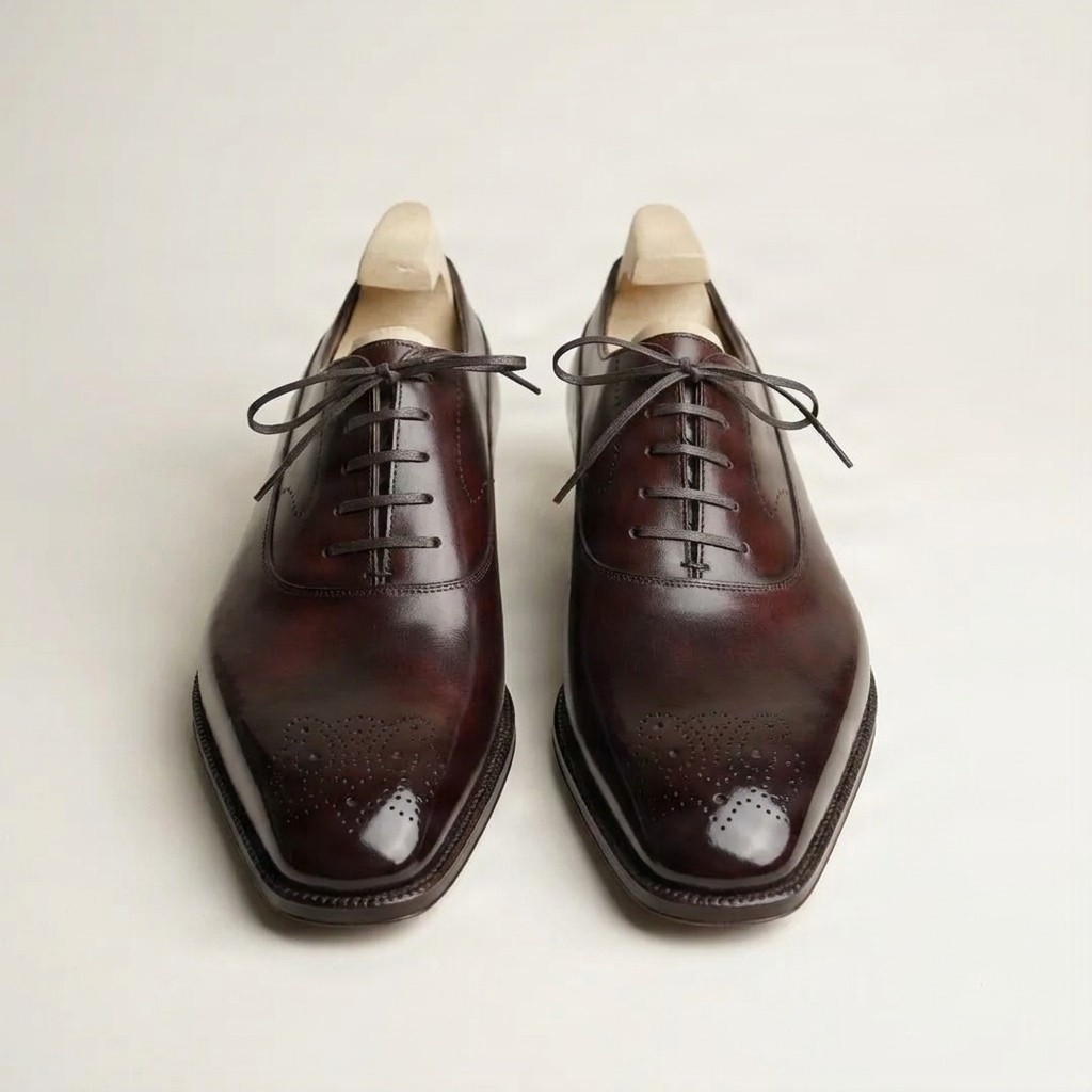 Burgundy leather cap toe brogues medallion for men