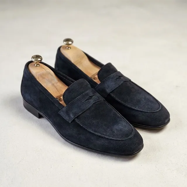 Navy suede penny loafers