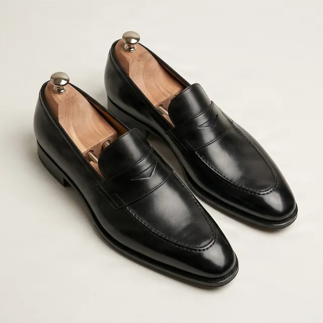 Black leather penny loafers strap