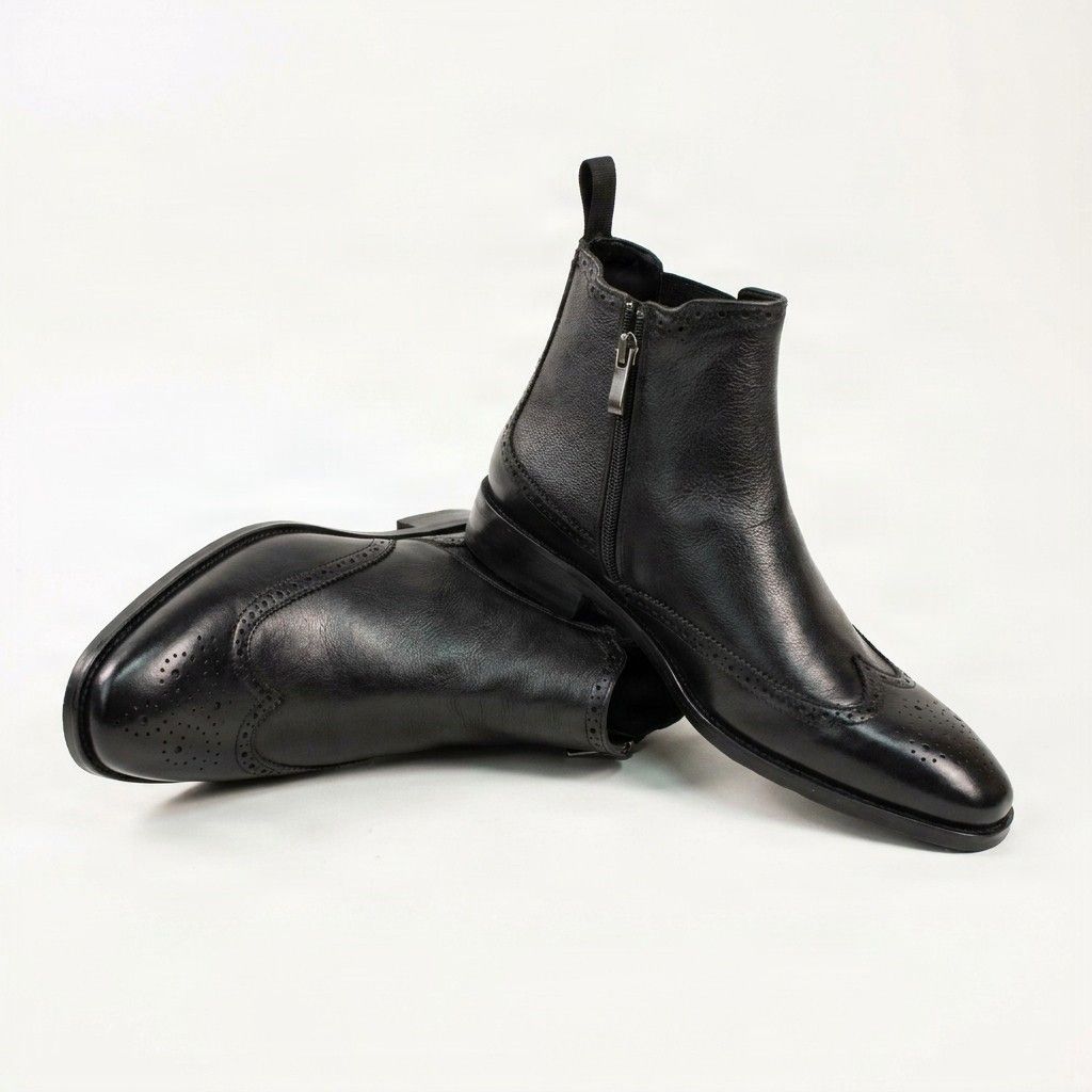 Black leather chelsea boots wingtip