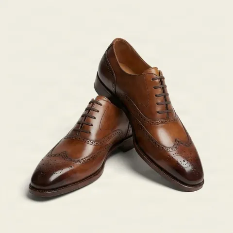 Brown leather wingtip brogues