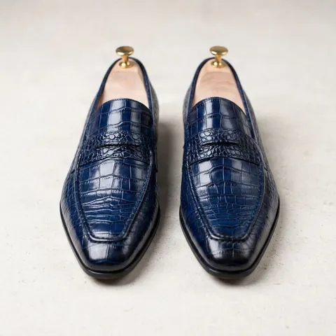 Navy alligator penny loafers