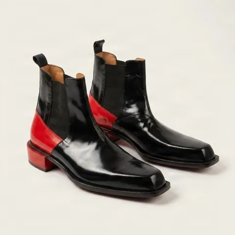 Black and red leather chelsea boots