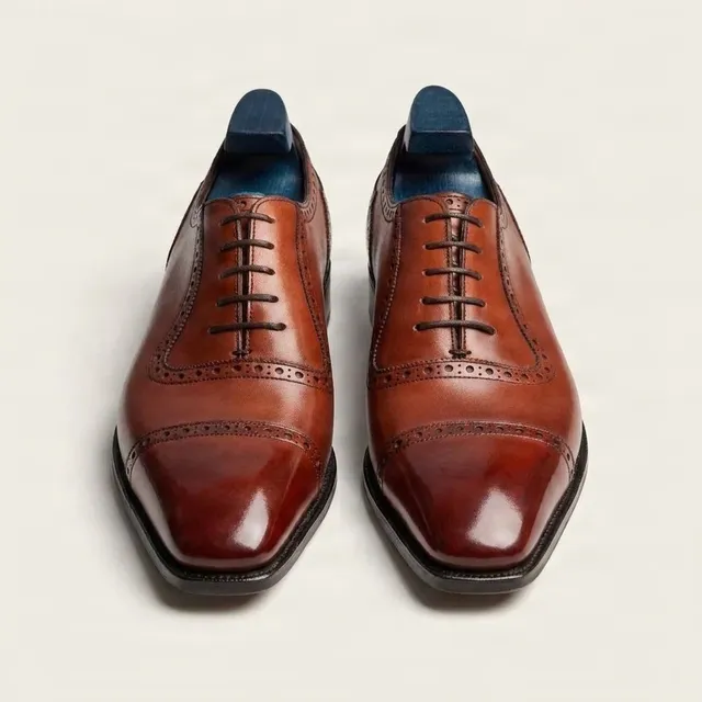 Cognac leather cap toe brogues