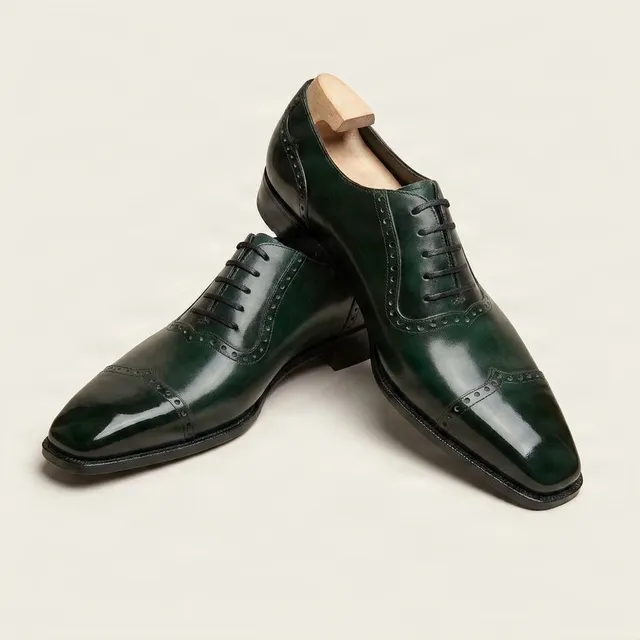 Green leather cap toe brogues