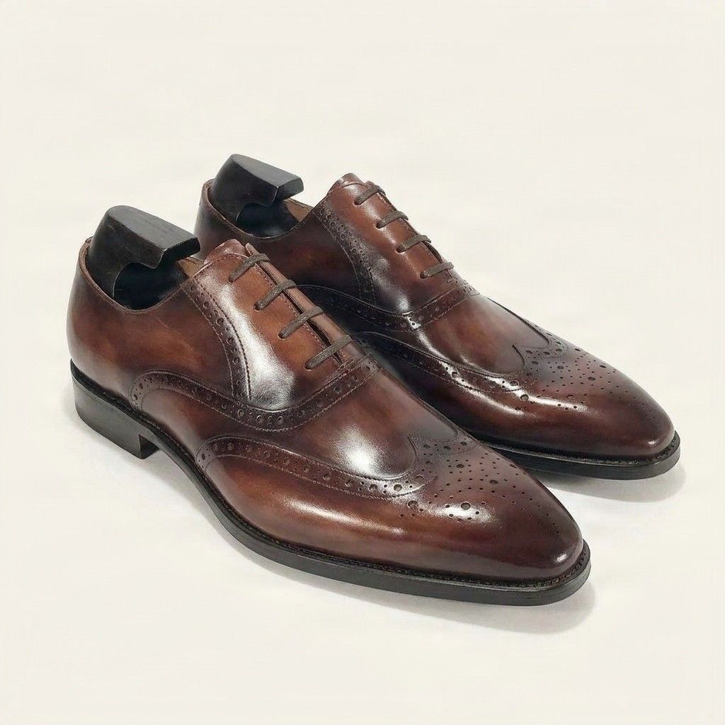 Brown leather wingtip brogues almond toe
