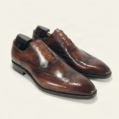 Brown leather wingtip brogues almond toe