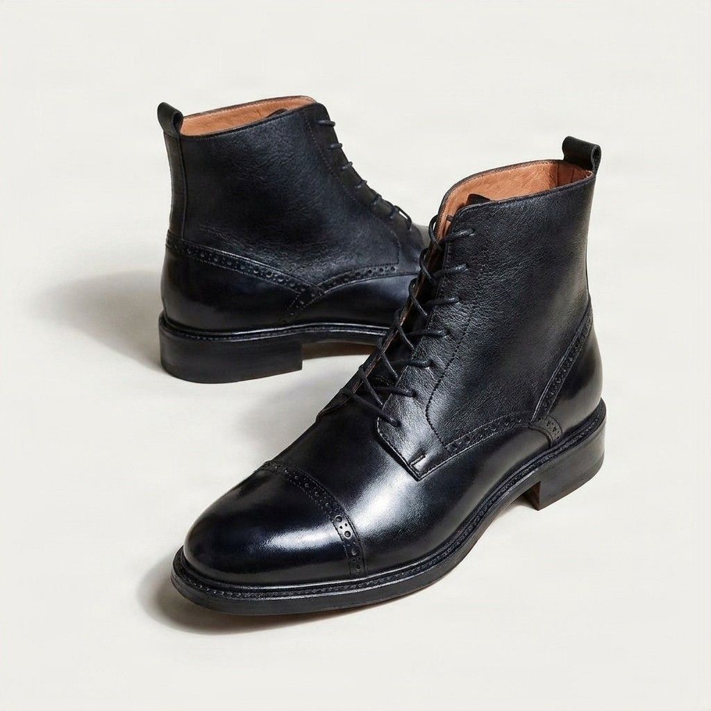 Black leather ankle boots cap toe brogued
