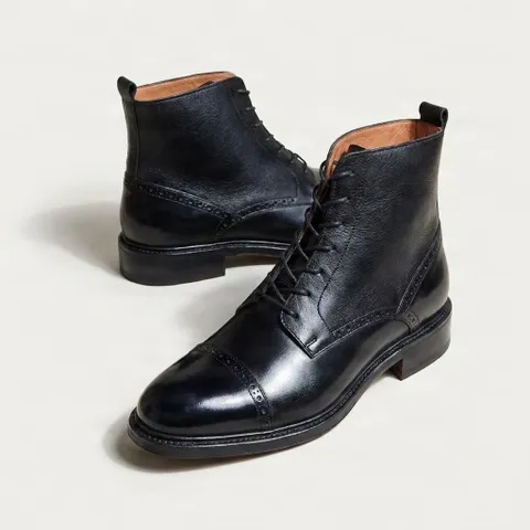 Black leather ankle boots cap toe brogued