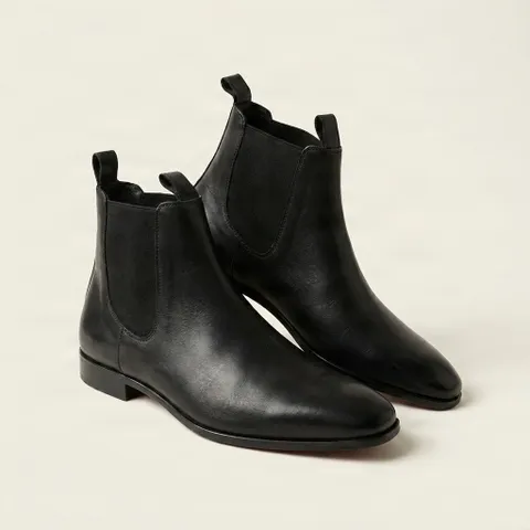 Black leather chelsea boots red