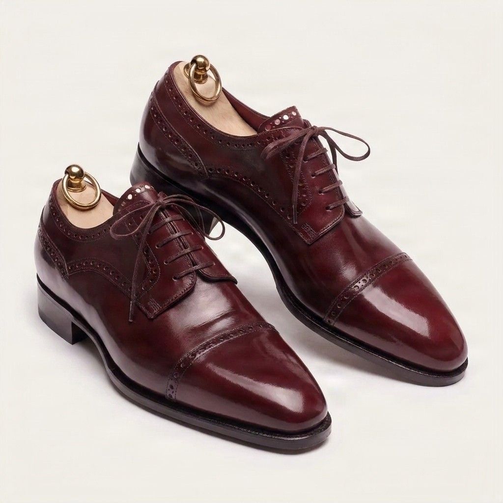 Burgundy leather cap toe brogues punched