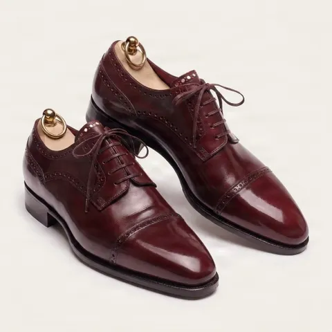 Burgundy leather cap toe brogues punched