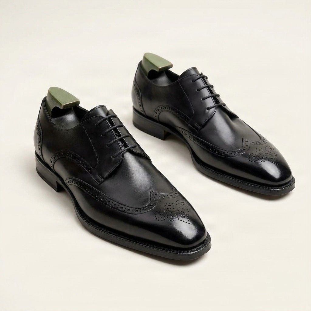 Black leather wingtip brogues