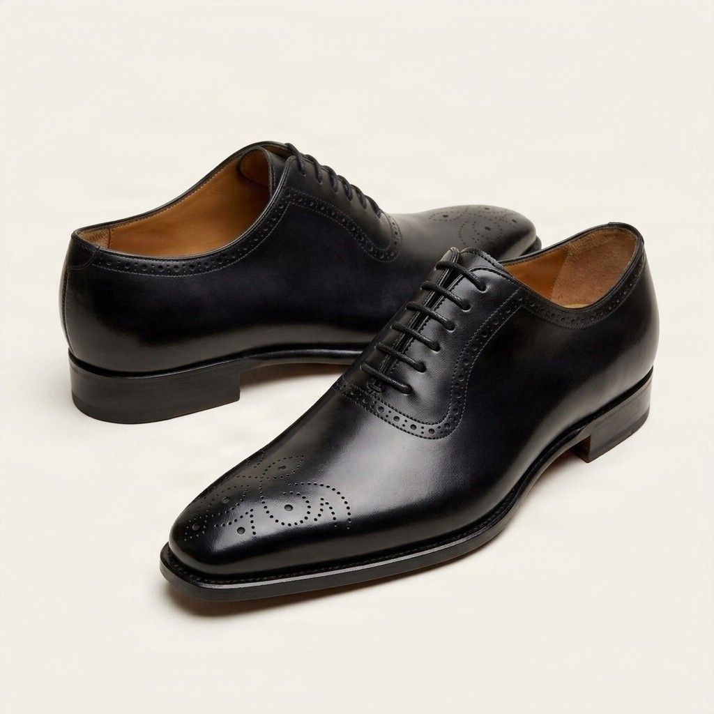 Black leather brogues medallion