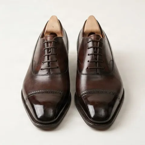 Brown leather oxford shoes cap toe brogue