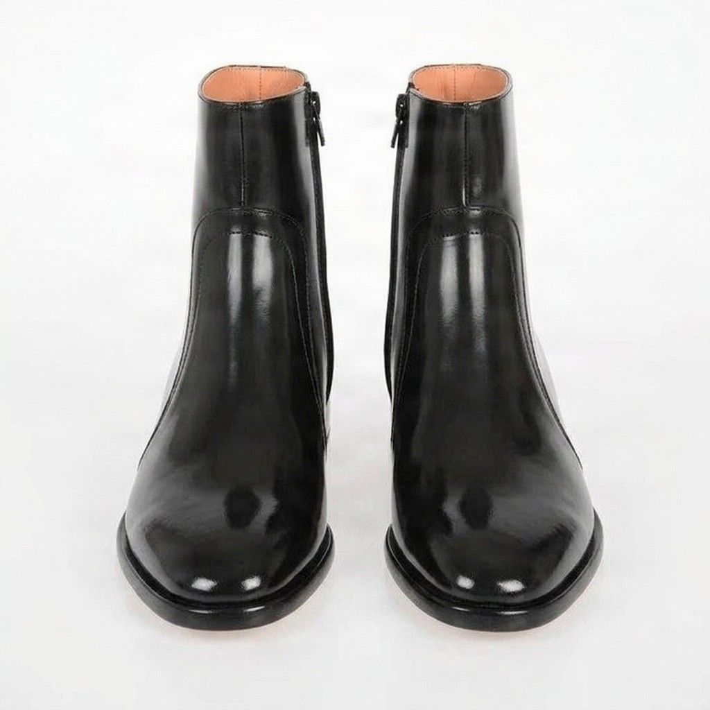 Black patent leather chelsea boots
