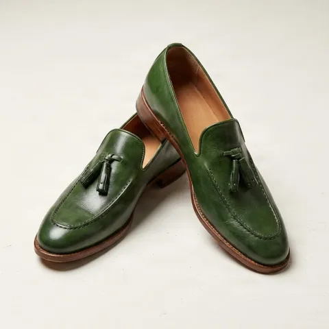 Green leather tassel loafers