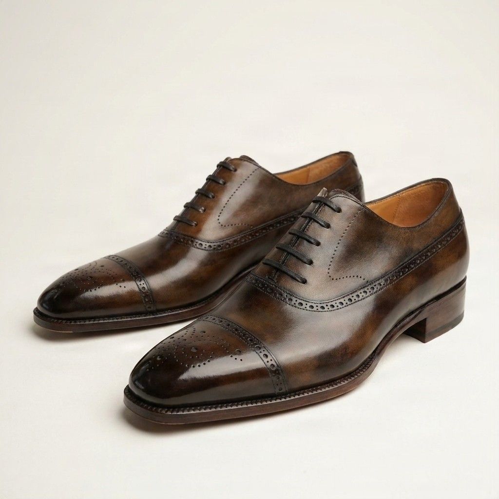 Brown leather cap toe brogues punched seams