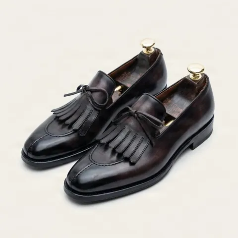 Brown leather tassel loafers split toe