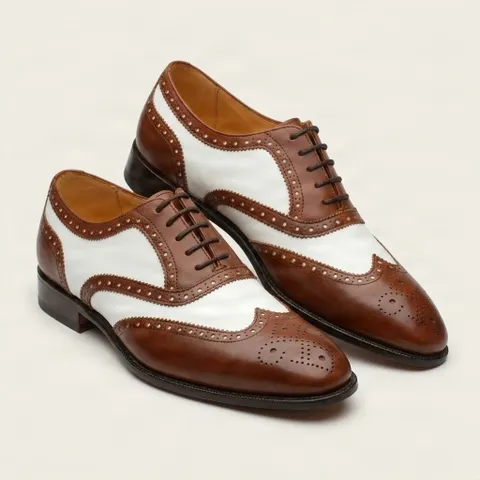 Brown and white leather brogues
