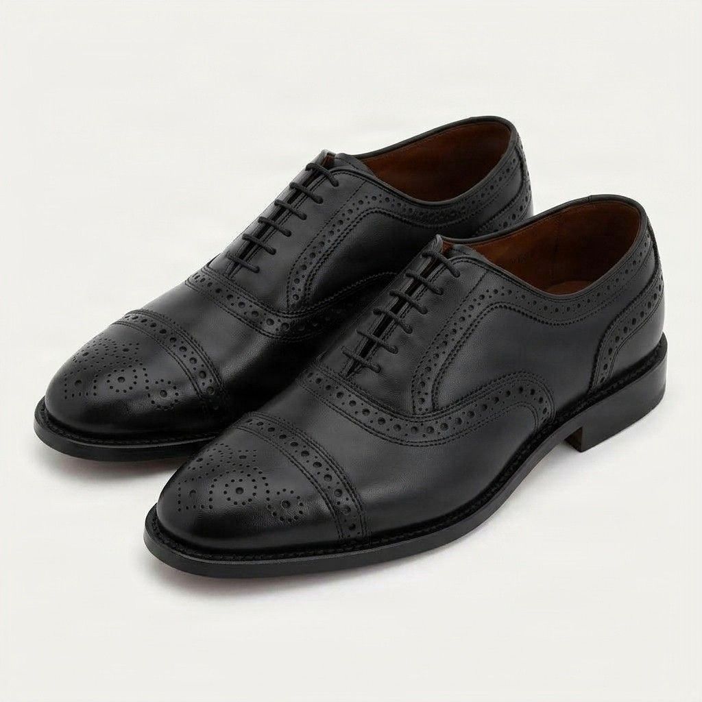 Black leather cap toe brogues punched seam