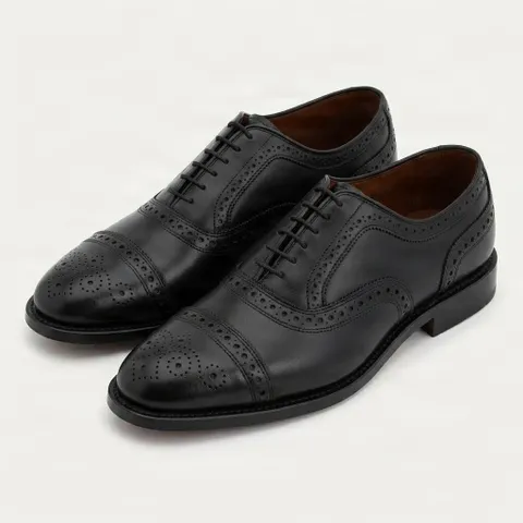 Black leather cap toe brogues punched seam