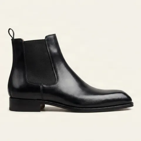 Black leather chelsea boots pull tab