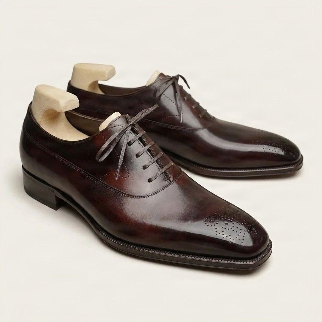 Burgundy leather cap toe brogues medallion